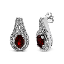 Load image into Gallery viewer, .925 Sterling Silver Diamond Accent and 8x6mm Red Oval Garnet Stud Earrings (I-J Color, I1-I2 Clarity)