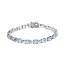 Load image into Gallery viewer, .925 Sterling Silver 11.0 Cttw Oval Shaped Created Light Blue Topaz Link Bracelet - 7 inch