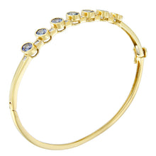 将图片加载到图库查看器,14K Yellow Gold Alternating Bezel Set 5MM Oval Shaped Tanzanite and 1/5 Cttw Diamond Bangle Bracelet (H-I Color, VS2-SI1 Clarity) - Fit's wrists up to 7.25" Inches