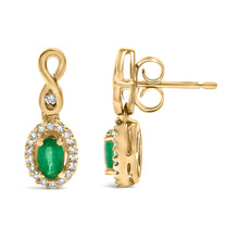 Load image into Gallery viewer, 10K Yellow Gold Oval Cut Green Emerald 5x3 mm and 1/7 Cttw Round Diamond Dangle Earrings