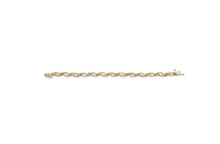 Load image into Gallery viewer, 10K Yellow and White Gold 1/2 Cttw Channel Set Diamond Infinity Link 7" Tennis Bracelet (H-I Color, I1-I2 Clarity)