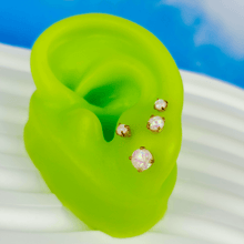 Load image into Gallery viewer, 20G White Faux Opal Gold Tone 3mm to 5mm Stud Earrings Set of 3