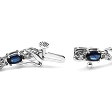 将图片加载到图库查看器,10K White Gold 5x4mm Oval Sapphire Gemstone and 1/10 Cttw Diamond Prong Set "X" Link Bracelet - Size 7" (H-I Color, SI1-SI2 Clarity)