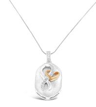 Load image into Gallery viewer, 10k Rose Gold and Sterling Silver 1/10ct TDW Round Cut Diamond Interlocked Heart and Ribbon Pendant Necklace (H-I, I1-I2)