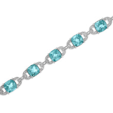 Load image into Gallery viewer, .925 Sterling Silver 7x7 mm Cushion Cut Blue Topaz and 1/20 cttw Round Cut Diamond Fashion Tennis Bracelet (I-J Color, I1-I2 Clarity) - 7"
