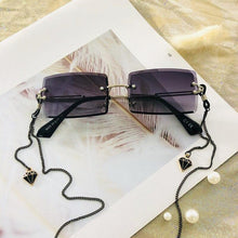 Load image into Gallery viewer, Fashion Rimless Women Trendy Small Rectangle Sunglasses With High Quality metal frame And UV400 Protection