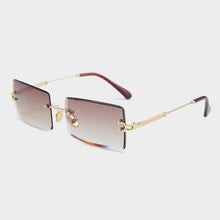 Load image into Gallery viewer, Fashion Rimless Women Trendy Small Rectangle Sunglasses With High Quality metal frame And UV400 Protection