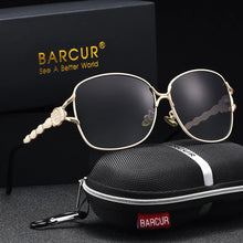 Load image into Gallery viewer, BARCUR Women’s Polarized Sunglasses – Oversized Elliptical Black Frame UV400 Protection Outdoor Fashion Mirror Leg Design High Quality Trendy Style Sunglasses for Travel Driving & Summer Apparel