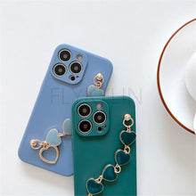 Load image into Gallery viewer, Soft Silicone Love Heart Chain Luxury Soft Flexible with Love Heart Chain Bracelet Hand Strap Girly Women Protective Cover for iPhone Wrist Bracelet Phone Case For iPhone 12 13 14 Pro Max Mini 11 Pro Max X XS Max XR 7 8 Plus