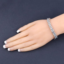 Load image into Gallery viewer, 17.22 Carat Genuine Blue Topaz and White Diamond .925 Sterling Silver Bracelet
