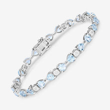 Load image into Gallery viewer, 11.10 Carat Genuine Blue Topaz and White Diamond .925 Sterling Silver Bracelet