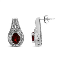 Load image into Gallery viewer, .925 Sterling Silver Diamond Accent and 8x6mm Red Oval Garnet Stud Earrings (I-J Color, I1-I2 Clarity)