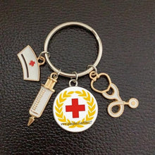 Load image into Gallery viewer, Creative Doctor Keychain Unique Personality Syringe Stethoscope Pendant Keychain Cartoon Colorful Handbag Pendant Keychain Doctor Injection Stethoscope Picture Keychain Round Dome Pendant Women Alloy Keychain
