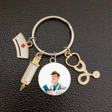 Load image into Gallery viewer, Creative Doctor Keychain Unique Personality Syringe Stethoscope Pendant Keychain Cartoon Colorful Handbag Pendant Keychain Doctor Injection Stethoscope Picture Keychain Round Dome Pendant Women Alloy Keychain