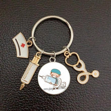 Load image into Gallery viewer, Creative Doctor Keychain Unique Personality Syringe Stethoscope Pendant Keychain Cartoon Colorful Handbag Pendant Keychain Doctor Injection Stethoscope Picture Keychain Round Dome Pendant Women Alloy Keychain