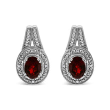 Load image into Gallery viewer, .925 Sterling Silver Diamond Accent and 8x6mm Red Oval Garnet Stud Earrings (I-J Color, I1-I2 Clarity)