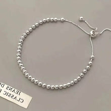 将图片加载到图库查看器,Simple Beads Pulling Bracelet