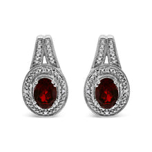 Load image into Gallery viewer, .925 Sterling Silver Diamond Accent and 8x6mm Red Oval Garnet Stud Earrings (I-J Color, I1-I2 Clarity)
