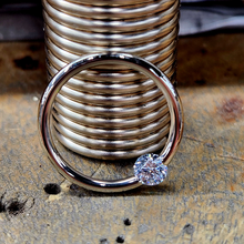 Load image into Gallery viewer, 16G 3/8 Solid 14k Yellow Gold 3mm Clear Cubic Zirconia Tension Captive Ring

