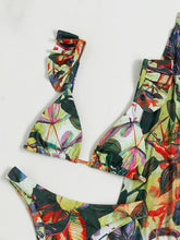 Load image into Gallery viewer, Bloom Breeze 3-Piece Bikini Set – Elegant High Cut Floral Fluttering Swimsuit with Lettuce Trim Tie Back Bandeau and Coordinating Cover Up Skirt – Women's Romantic Swimwear for Beach &amp; Resort Vacations
