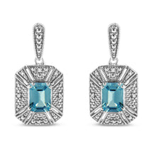 Load image into Gallery viewer, .925 Sterling Silver 7x5MM Emerald Shape Blue Topaz and Diamond Accent Art Deco Halo Style Drop and Dangle Earrings (I-J Color, I1-I2 Clarity)
