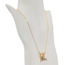 Load image into Gallery viewer, Gold Tone Jeweled Fab Revolver Charm Necklace
