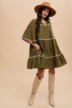 Load image into Gallery viewer, Tassel Contrast Trim Tie Neck Half Sleeve Tiered Dress – Bohemian Tassel Details, Contrast Trim, and Tiered Design for a Flowing, Feminine Look
