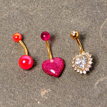 Load image into Gallery viewer, Clear Gem Gold Tone Pink UV Glow Heart Belly Ring Set of 3
