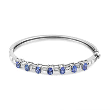 Load image into Gallery viewer, 14K White Gold 5 MM Oval Blue Tanzanite and 1/4 Cttw Diamond Bangle (H-I Color, VS2-SI1 Clarity) - Fits wrists up to 7 1/2 Inches

