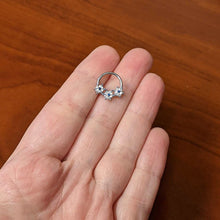 将图片加载到图库查看器，16G 3/8 Clear Blue Gem Festive Trio Snowflake Hinged Segment Ring
