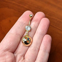 Load image into Gallery viewer, Licensed Dragonball Z Clear CZ Gem Gold Hue Starball Dangle Belly Ring
