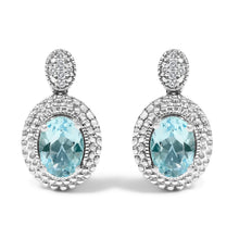 Load image into Gallery viewer, .925 Sterling Silver Diamond Accent and  Oval Blue Topaz with Beaded Halo Drop Stud Earrings (I-J color, I1-I2 Clarity)
