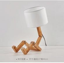 Load image into Gallery viewer, New Modern Luxury and Retro STEVVEX Wood Robot Shape Folding Table Lamp Creative European Fashion Bedroom Study Bedroom Bedside Linen Lamp Shade Table Lamp
