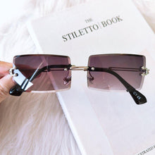 Load image into Gallery viewer, Fashion Rimless  Women Trendy Small Rectangle Sunglasses With High Quality metal frame And UV400 Protection
