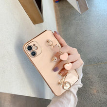Load image into Gallery viewer, Luxury Women Silicone Phone Case Cover With Wrist Chain Bracelet for iPhone  Wristband Bracelet Hand Holder Cover for iPhone 13 12 11 Pro Max plating Case Heart Chain Cases for iPhone 7 8 Plus XR XS Max X
