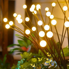 Load image into Gallery viewer, 8 LED Solar Firefly Garden Lights – Waterproof Warm White Outdoor Pathway &amp; Patio Decoration

