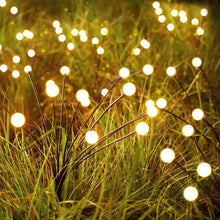 Load image into Gallery viewer, 8 LED Solar Firefly Garden Lights – Waterproof Warm White Outdoor Pathway &amp; Patio Decoration
