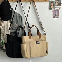 Load image into Gallery viewer, Urban Minimalist Female Student Large Capacity Commuting Horizontal Canvas Single Shoulder Diagonal Cross Portable Tote Bag
