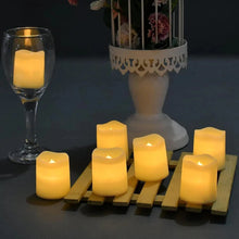 Load image into Gallery viewer, Flickering LED Ivory Electronic Candle, Flameless Tealight Candle, Battery Operated LED Tealight Candle, Ideal for Weddings, Tab
