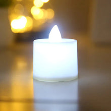 Load image into Gallery viewer, 1/6/12Pcs Flameless LED Tea Light Candles – Battery-Powered, Safe, and Reusable for Weddings, Parties, and Home Décor
