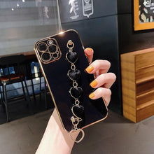Load image into Gallery viewer, Luxury Women Silicone Phone Case Cover With Wrist Chain Bracelet for iPhone  Wristband Bracelet Hand Holder Cover for iPhone 13 12 11 Pro Max plating Case Heart Chain Cases for iPhone 7 8 Plus XR XS Max X

