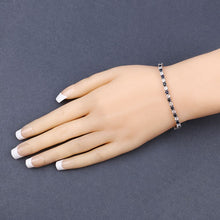 Load image into Gallery viewer, 6.87 ct. t.w. Blue Sapphire and White Topaz Bracelet in Sterling Silver
