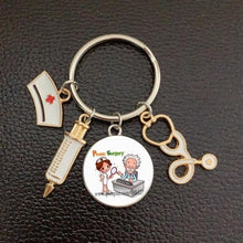 Load image into Gallery viewer, Creative Doctor Keychain Unique Personality Syringe Stethoscope Pendant Keychain Cartoon Colorful Handbag Pendant Keychain Doctor Injection Stethoscope Picture Keychain Round Dome Pendant Women Alloy Keychain
