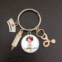 Load image into Gallery viewer, Creative Doctor Keychain Unique Personality Syringe Stethoscope Pendant Keychain Cartoon Colorful Handbag Pendant Keychain Doctor Injection Stethoscope Picture Keychain Round Dome Pendant Women Alloy Keychain
