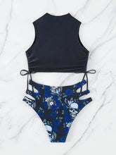 Load image into Gallery viewer, Bikini Skull Print Hollow-Out 2 Piece Swimsuit for Women – Sexy Lace-Up Floral Tie Bathing Suit with Crew Neck – High Stretch Halloween Inspired Bikini Set for Beach Party, Festival, and Summer Vacation
