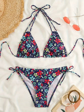 Load image into Gallery viewer, Sunset Bloom 2-Piece Triangle Bikini Set for Women – Vibrant Random Floral Print Halter Neck Swimsuit with Tie-Back Tie-Side Bottoms &amp; High Cut Legs – Women's High-Stretch Swimwear for Summer Beach Escapes
