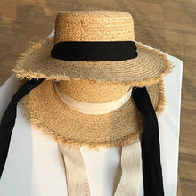 Load image into Gallery viewer, Vintage Straw Hat Women Wide Sun Protection Beach Hat Black And White Ribbon Bowknot Cute Design Straw Cap Women Elegant Summer Hat Beach Fedoras Casual Ladies Flat Top Hat
